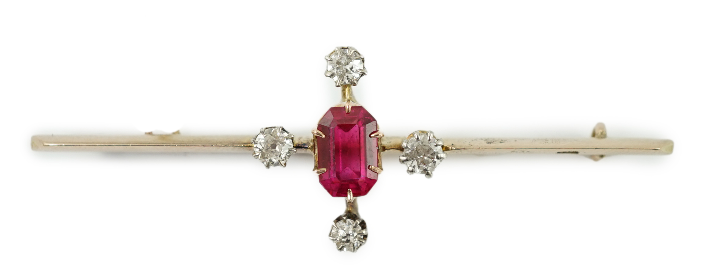 An early to mid 20th century gold, single stone oval cut synthetic ruby and four stone round cut diamond set bar brooch